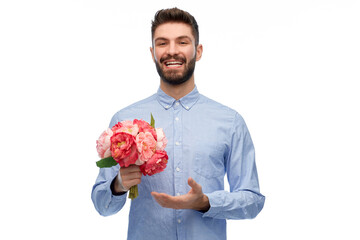 international women's day and greeting concept - happy smiling man with bunch of flowers over white background