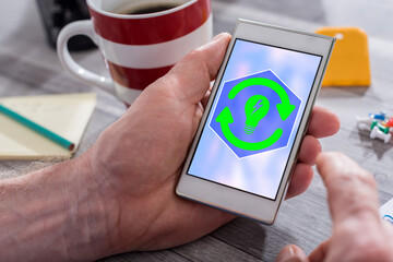 Renewable energy concept on a smartphone