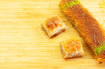 Traditional desserts on wooden tray