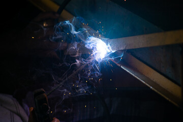 welder welding steel