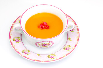 Delicious vegetable soup in bowl on white background