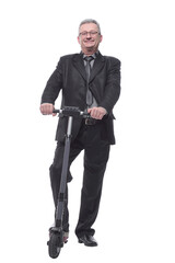 Fototapeta na wymiar Front view of mature business man with scooter