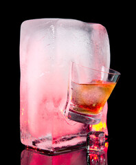 Whisky on the Rocks Glass Ice Cube Melting - Black Background
