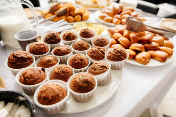 Coffee break: muffins, pies and tea © Viacheslav Samosudov