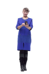 Businesswoman using smartphone and looking at camera