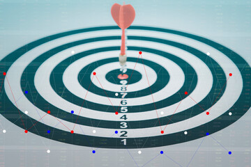 Close up shot of the dart arrow hit on bullseye, red dart arrow hitting in the target center of dartboard Target hit in the center, challenge in business marketing,Target and goal as concept.