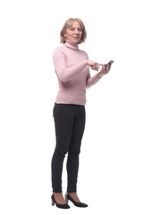 Side view of a casual woman texting on her phone