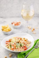 Shrimp salad with fresh vegetables, cheese and croutons.