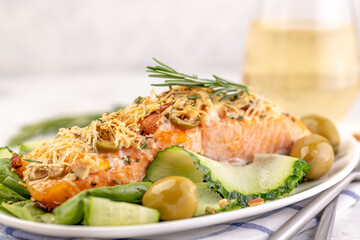 Fillet of red fish baked with cheese.