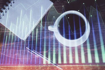 Double exposure of forex graph drawing and work table top veiw. Concept of financial analysis.