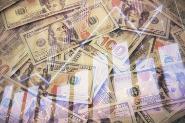 Multi exposure of forex chart drawing over us dollars bill background. Concept of financial success markets.