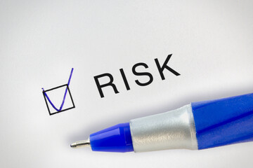 Risk Management concept text on test paper with check mark in form box. Business insurance terms with check mark series.