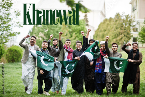 Khanewal city. Group of pakistani man wearing traditional clothes with national flags. Biggest cities of Pakistan concept.