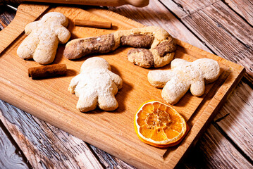 Gingerbread Christmas cookies with cinnamon and dried orange