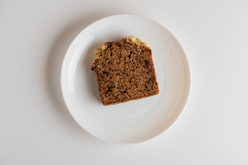 Breakfast pastry. Breads. Classic American bread. Bread made with bananas, walnuts sugar and butter. Baked to a golden brown and served with fresh banana slices and butter. 