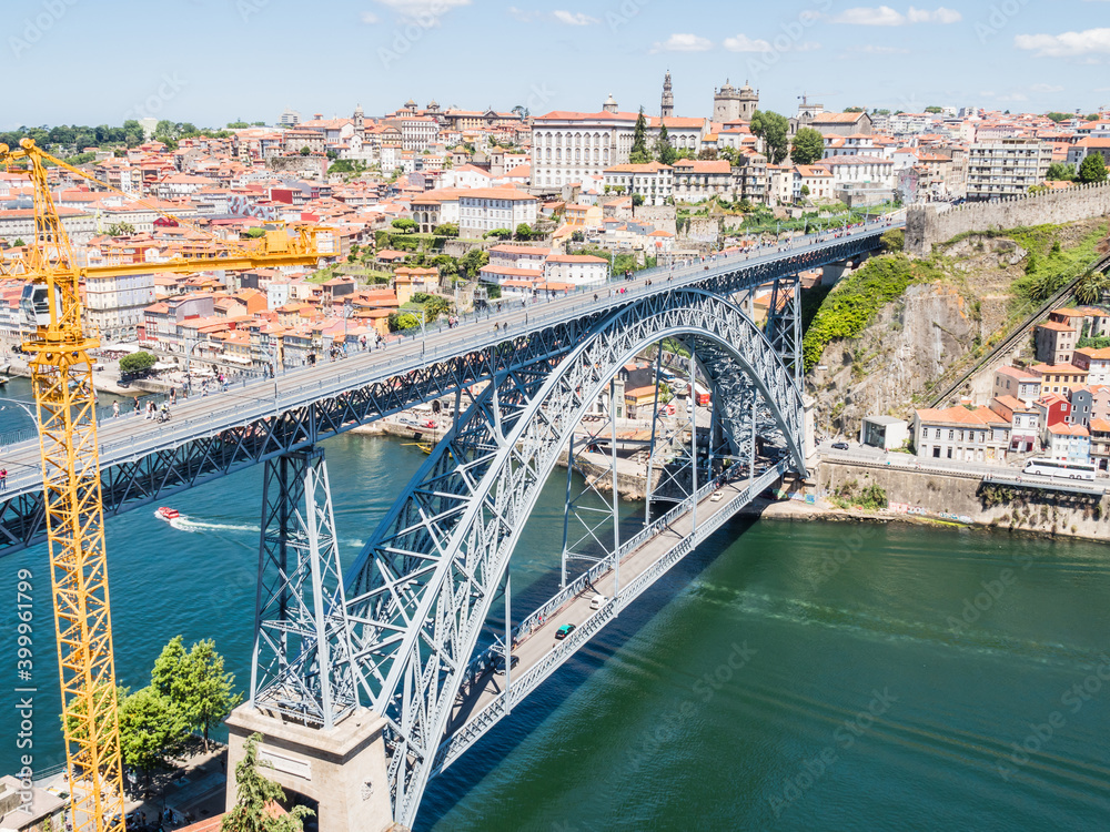 Wall mural PORTO, PORTUGAL - JUNE 11, 2019: Luis I bridge and Douro river. It is the second-largest city in Portugal. It was proclaimed a World Heritage Site by UNESCO in 1996.