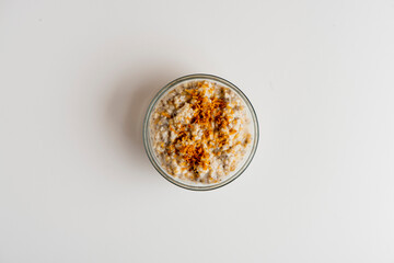 Oatmeal. Old fashioned oats served with cinnamon, sugar, butter, fresh mixed berries walnuts and dried fruit. Classic healthy breakfast favorite.