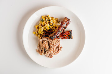 Pork ribs. Barbecue pork ribs served with classic bbq sides Mac n cheese, cornbread, Brussels sprouts, coleslaw & beer. Classic traditional Texas meats & side dishes.