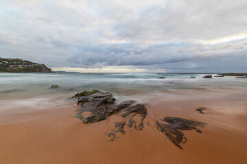 Cloudy view of the coast of Whale Beach in the morning, Sydney, Australia.