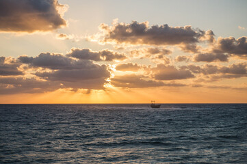 Naklejka na ściany i meble Sunset at Paphos, West coast of Cyprus. View on Mediterranean Sea.