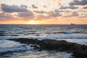Sunset at Paphos, West coast of Cyprus. View on Mediterranean Sea.