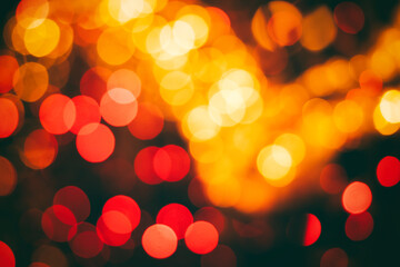 Golden red orange bokeh blurred festive background and texture