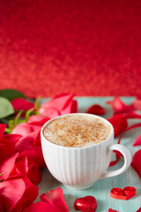 cup of coffee and hearts on light surface