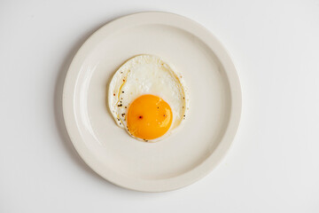 Eggs. Sunny side up or fried eggs. Cooking ingredients from a farmers markets, Fresh Fruits and  vegetables. Classic ingredients and garnishes used in restaurant cooking.