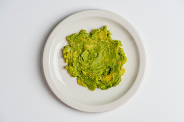 Guacamole. Spicy guacamole dip served with homemade crispy corn tortilla chips. Fresh avocados seasoned with salt, pepper, limes and salsa. Classic tex-mex, mexican restaurant appetizer favorite.