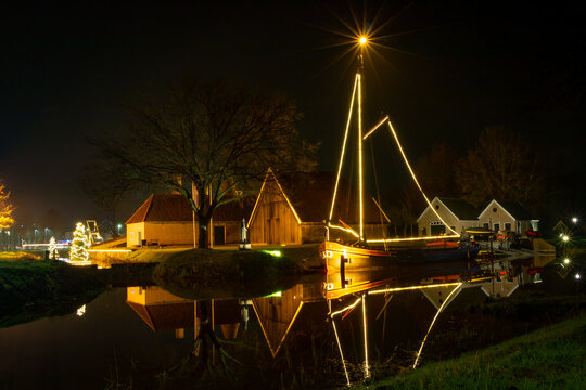 Complete restored lime kiln at night in the December month with a decoration of Christmas lights in  village Dedemsvaart the Netherlands