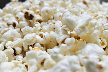 closeup of heap white salty popcorn