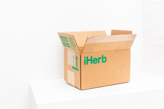  The package of Iherb with vitamins, Editorial