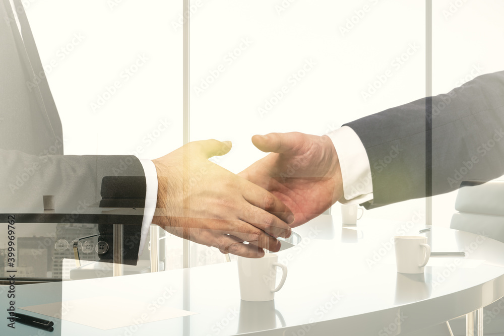 Wall mural handshake of two businessmen on conference room interior background, deal and partnership concept. m