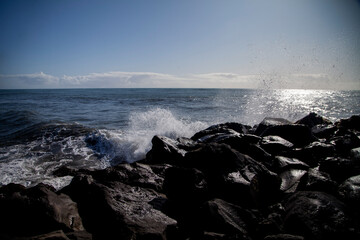 waves crashing on rocks