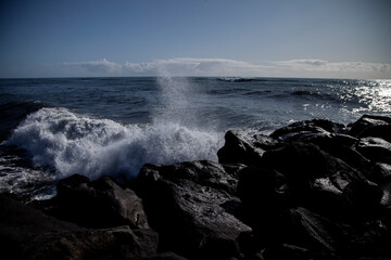 waves crashing on rocks
