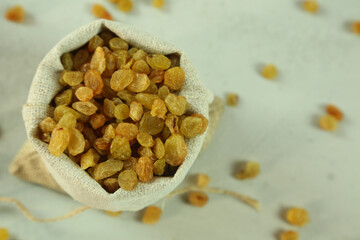 Dried raisins on white background