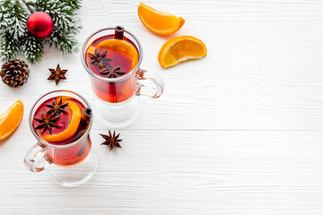 Obraz na płótnie Canvas Christmas mulled wine with ingredients and Christmas decoration