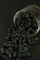 Dried raisins on white background