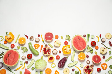 Fresh organic fruits and vegetables on white background, flat lay. Space for text