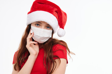 Fototapeta na wymiar cute girl medical mask new year clothes holiday christmas 