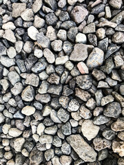 High angle view of pebbles on stone 
