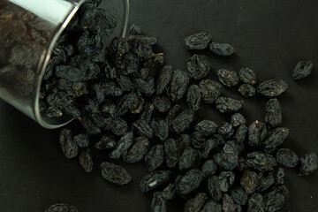 Dried raisins on white background