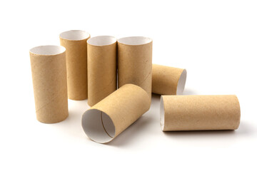 empty paper toilet rolls on white background