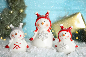 Funny little snowmen on table. Christmas decor