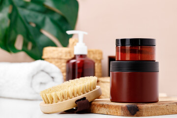 Brown skicare container against blue bathroom background