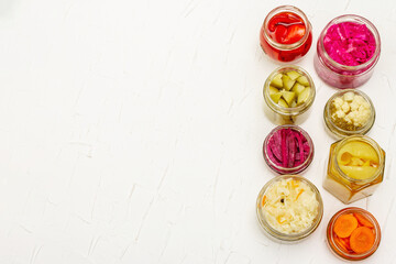 Obraz na płótnie Canvas Assorted of fermented vegetables in glass jars