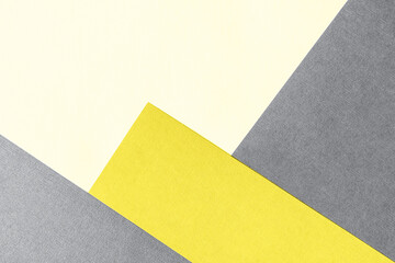 Paper for pastel overlap in trendy yellow and grey colors for background, banner, presentation template. Color 2021 concept.