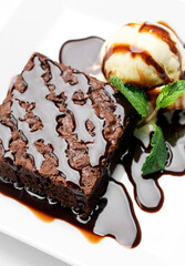 vegan chocolate brownie dessert with dairy-free vanilla ice cream