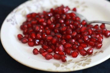 pomegranate seeds on a plate