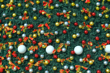 festive background with colored balls on christmas tree